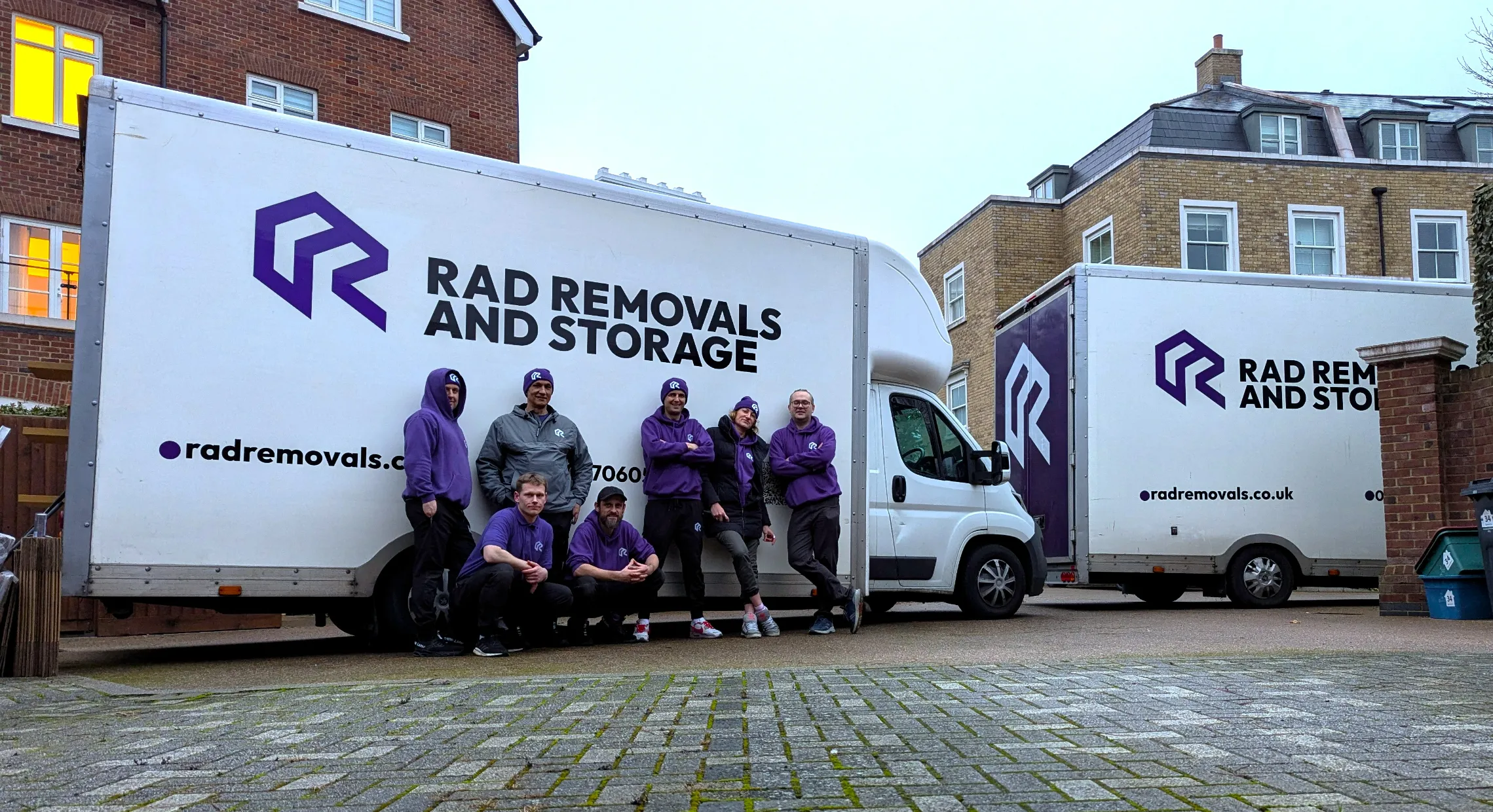Rad Removals team with branded vans in Isleworth, Hounslow, after a professional packing and moving job